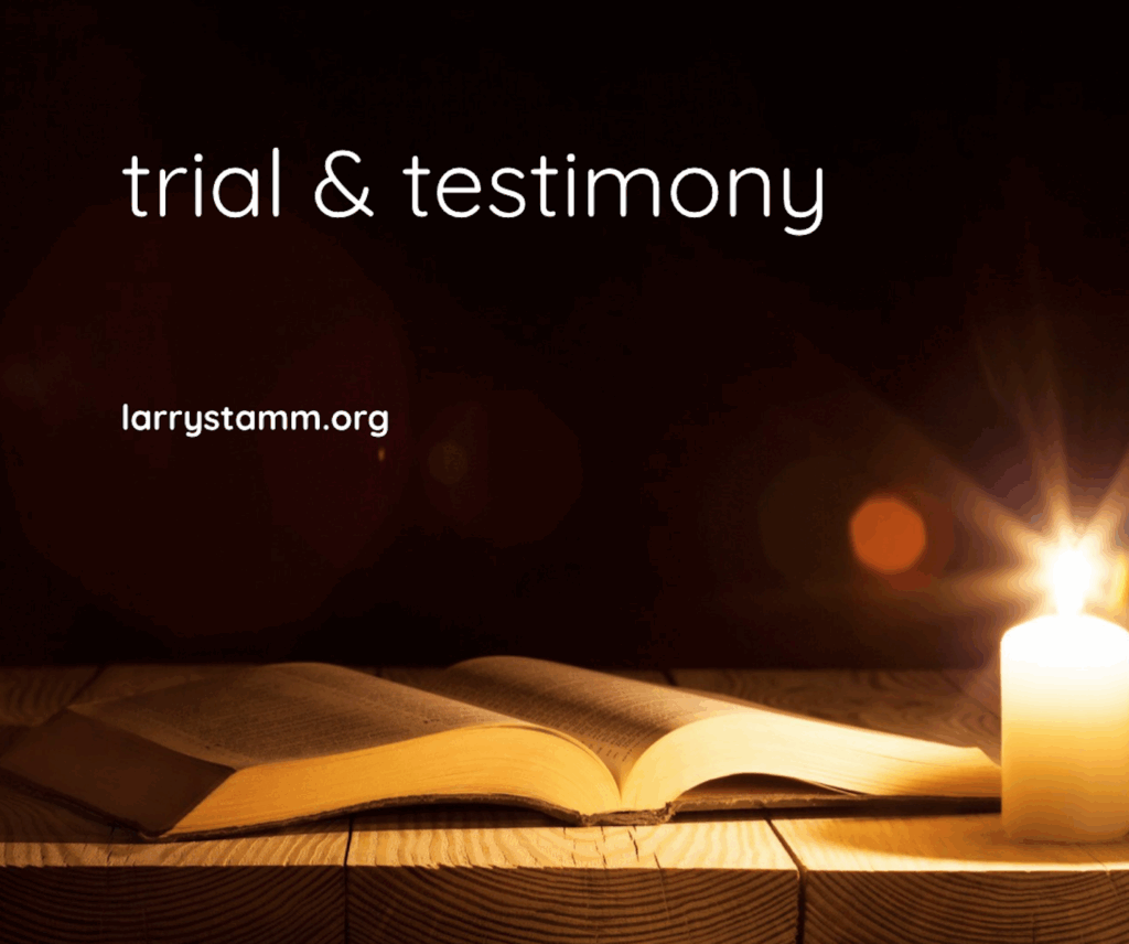 Open book and candle with text.